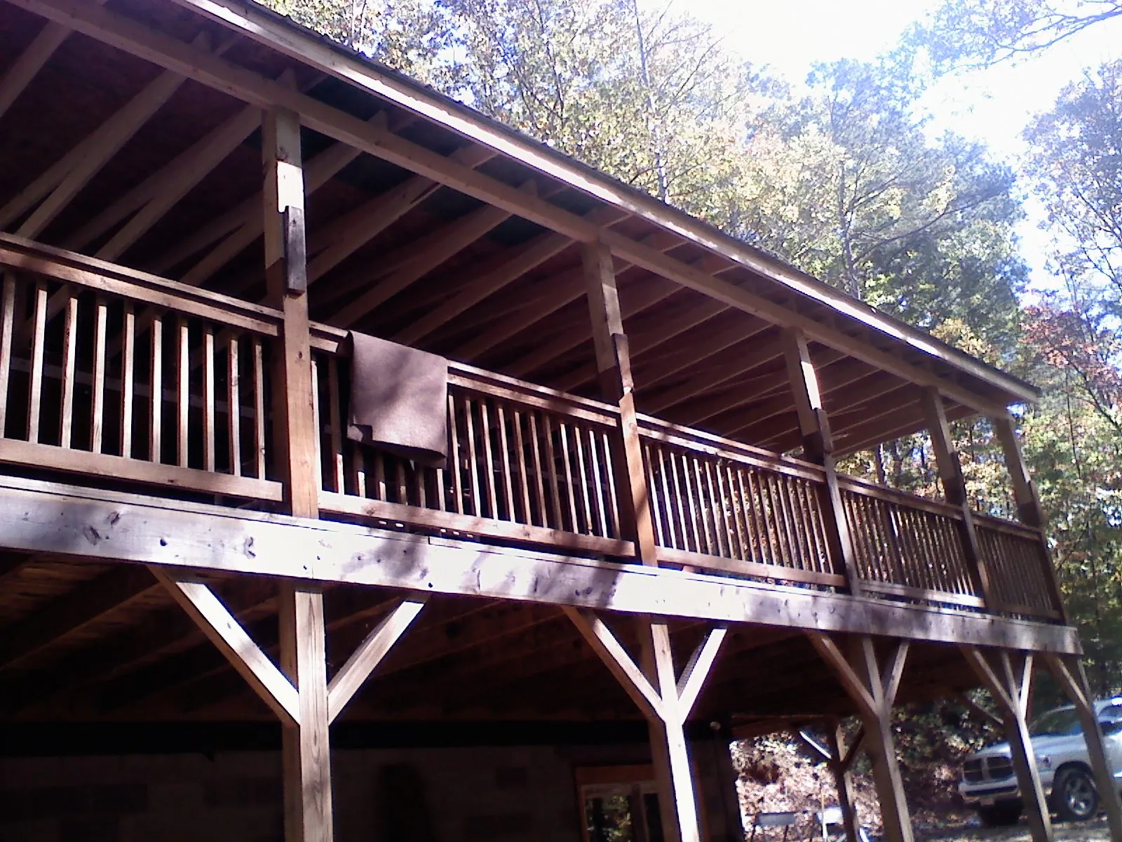 Timber framing under a new elevated porch and deck — Roof Leak Repair in Bascom by Roofing Brothers